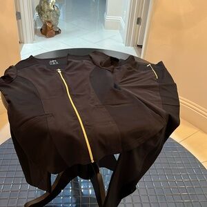 Black scrub set with gold zippers